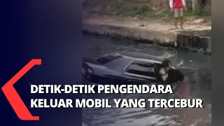 Detik-Detik Pengendara Mobil Keluar Kendaarannya yang Tercebur ke Sungai