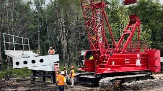 Manitowoc 10000A crane sets 58,450LB tubs in place for new Watco trestle. Kraemer CO Hallowell KS