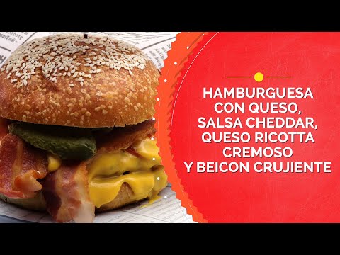 HAMBURGUESA CON QUESO, SALSA CHEDDAR, QUESO RICOTTA CREMOSO Y BEICON CRUJIENTE