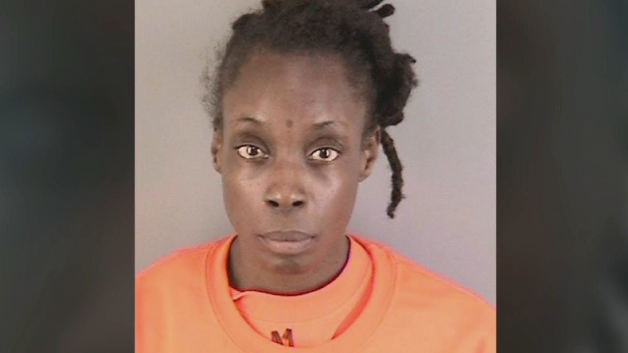 Woman arrested in connection with boy's body found in suitcase claims