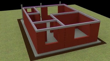 Constructing a house using interlocking blocks.