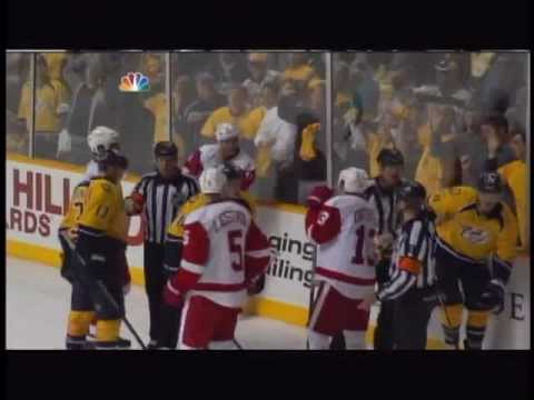 Shea Weber slams Henrik Zetterberg's head into the boards after Game 1