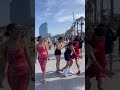 Guys do fake hug pranks on people walking by!