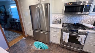 How to fix ge fridge leaking water on the floor