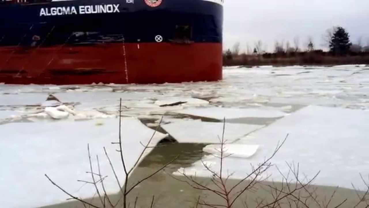 First ship going through the Welland Canal in 2014 breaking ice