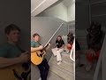 3 musicians find a stairwell and sing