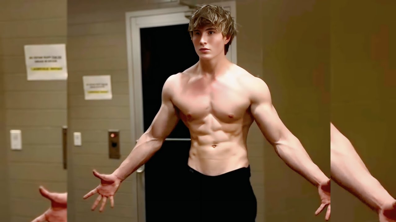 Невероятно рельефный пресс молодого бодибилдера, демонстрирующего свою мощь.