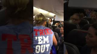 Police use taser on passenger, American Airlines