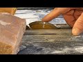 Andamooka concrete matrix opal: cutting large stones on a 4 inch saw.