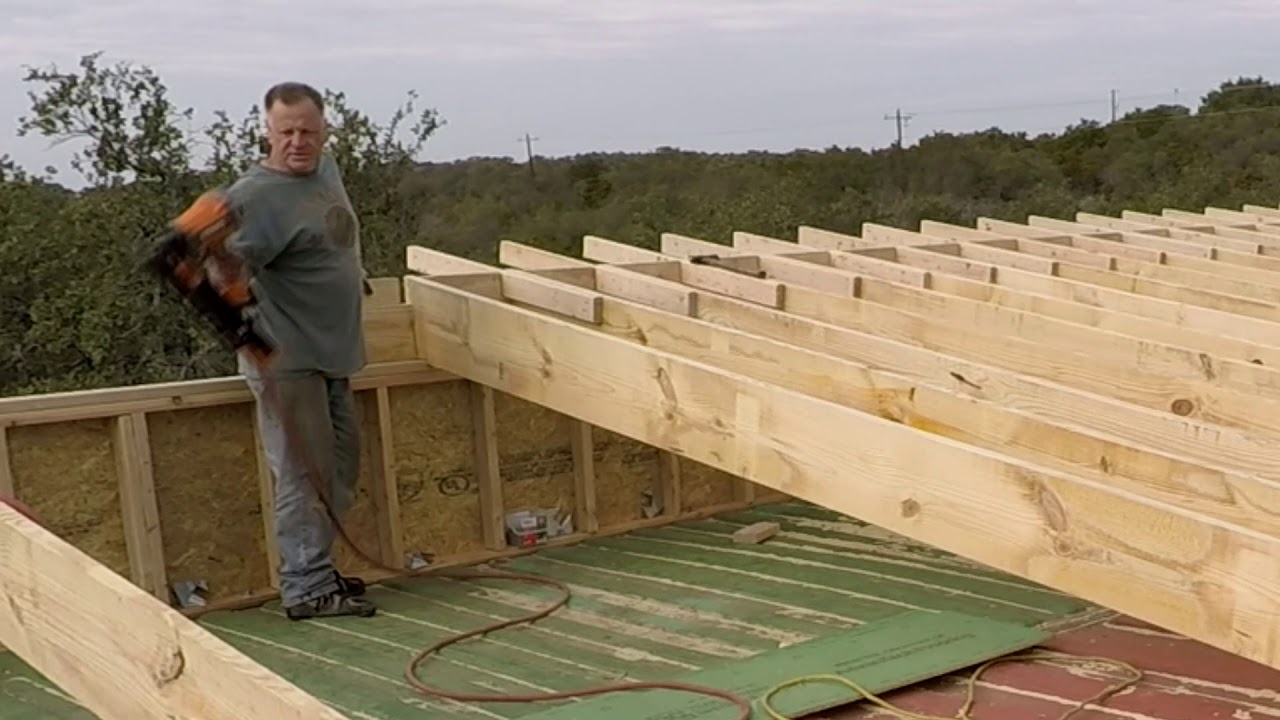 Container house DIY - 2x12 rafters, roof over the gaming room goes up ...