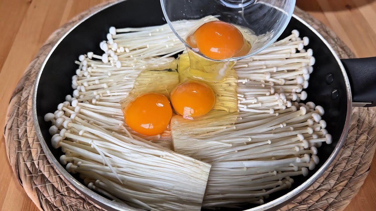 Pour eggs over enoki mushrooms, and magic will happen! My mom's secret recipe!