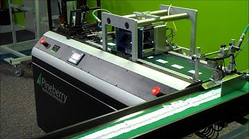 High speed labeling and tagging solution with integrated printer