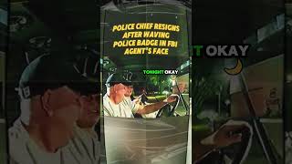 Police chief resigns after waving police badge in