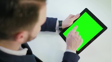 Man Using A Tablet With A Green Screen Stock Video