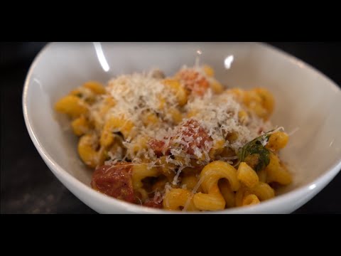 Cavatappi Pasta In Yellow Tomato Sauce w/ Spicy Lamb Sausage & Roasted Red Cherry Tomatoes