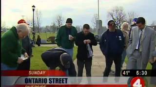 Volunteers restore lights to monument