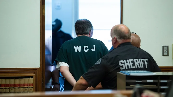 Timothy Bass reacts as Judge Olson sentences him t...