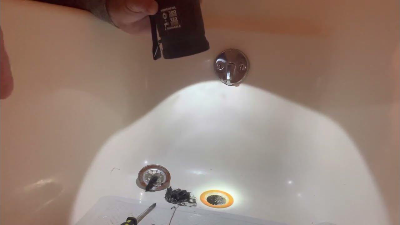 Bathtub not draining? Clogged bathtub drain. Quickest fix here on
