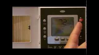 Carrier comfort thermostat button identification