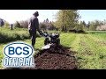 Breaking new ground with model 750 bcs twowheel tractor and rotary plow attachment