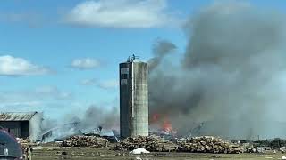 Barn collapses as fire crews battle blaze near Manilla.