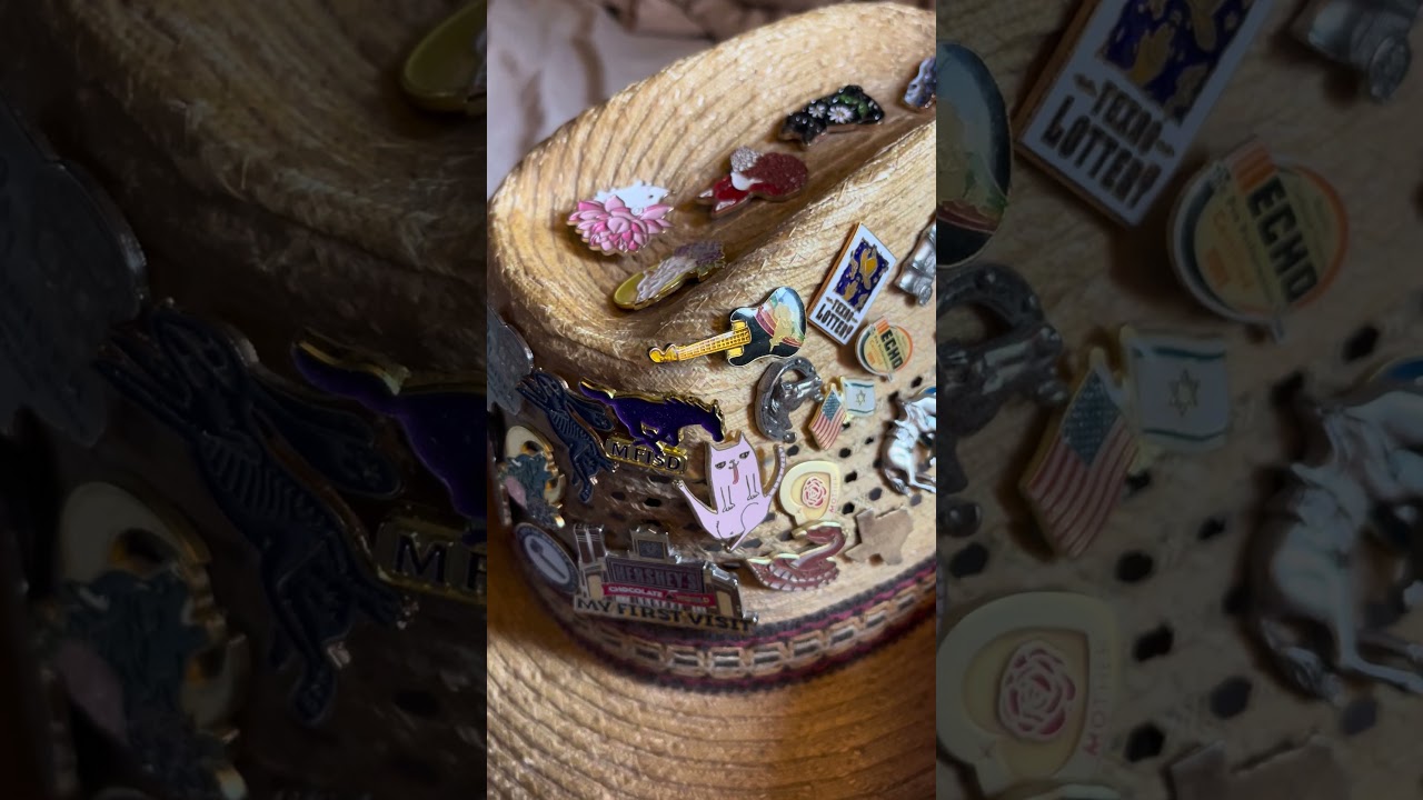 Showing off my pin collection.