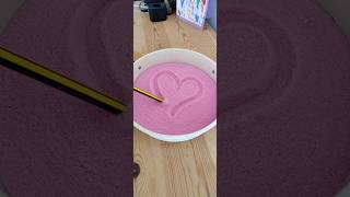 Using dyed salt as a sensory play activity for preschoolers is a great way to introduce mark making. Wealth