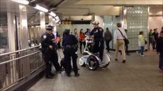 NYPD T3 TRANSPORTER SCOOTER UNIT PATROLLING THE VAST SUBWAY SYSTEM IN MANHATTAN, NEW YORK CITY.