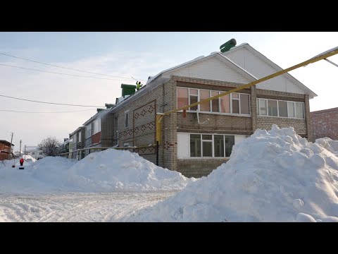 Управляющие компании зачищают крыши многоквартирных домов от снега