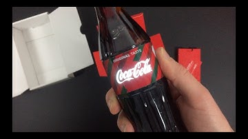 Unboxing Coca Cola limited #BeSanta Light-Up Bottle - OLED Labels by Inuru - Case Study
