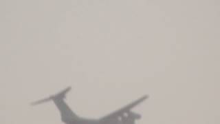 Ilyushin cargo aircraft leaving al maktoum airport dubai over jebel ali DUBAI WORLD CENTRAL
