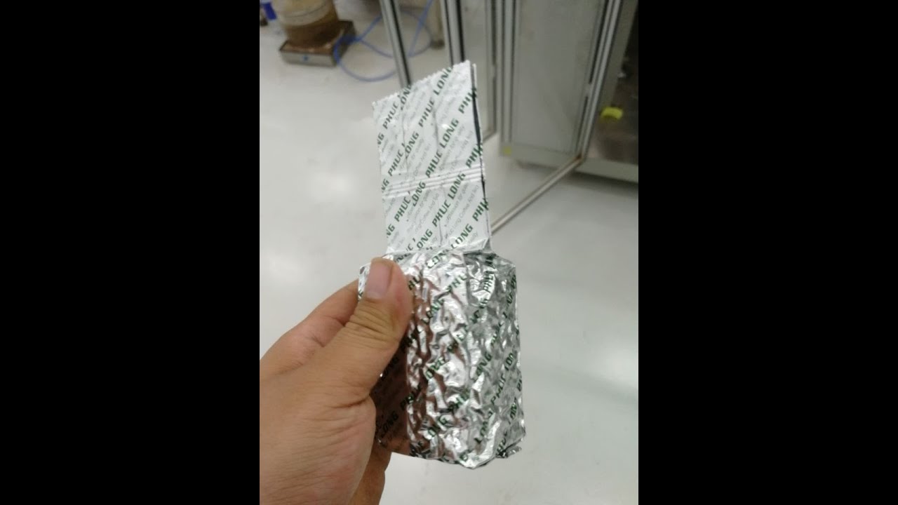 100g tea brick type bag automatic vacuum packaging machine