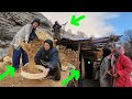 Mother's battle with cave humidity to build a stone hut