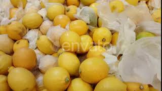Pile of soft yellow lemons in a market, pan motion | Stock Footage - Envato elements screenshot 2