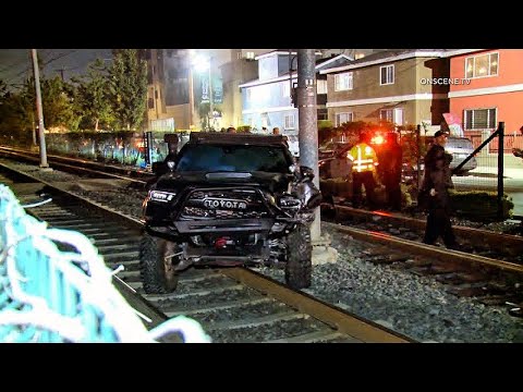 Danger on the Tracks: Driver Flees After Crashing onto Exposition Blvd ...