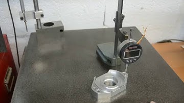 Using a dial gauge on a vernier height gauge