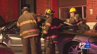 Cars crash into Pawtucket fire station, 2 people hurt