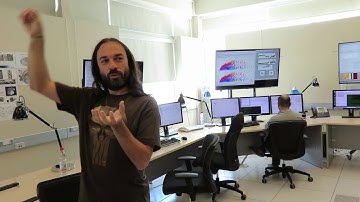 Scientist discussing ALMA Operations