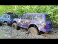 Stuck, a friend will help you get out. RC Car Jeep Cherokee and Toyota LC80. Mud off road