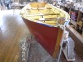 Flat-Bottom Wooden Sailing Skiff Flat-Bottom Wooden Sailing Skiff