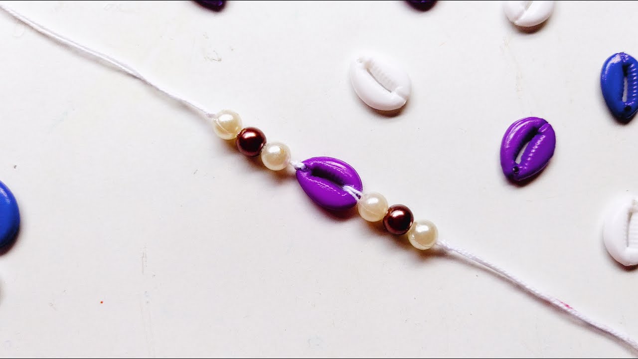Easy & Simple Cowrie shell rakhi ️ DIY Rakhi Or Friendship Band making ...