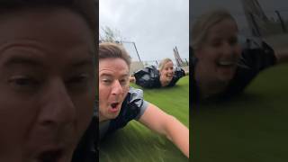 Who needs snow when you have rain, trash bags, and a hill? 🌧️🛷 Summer sledding! #summerfun