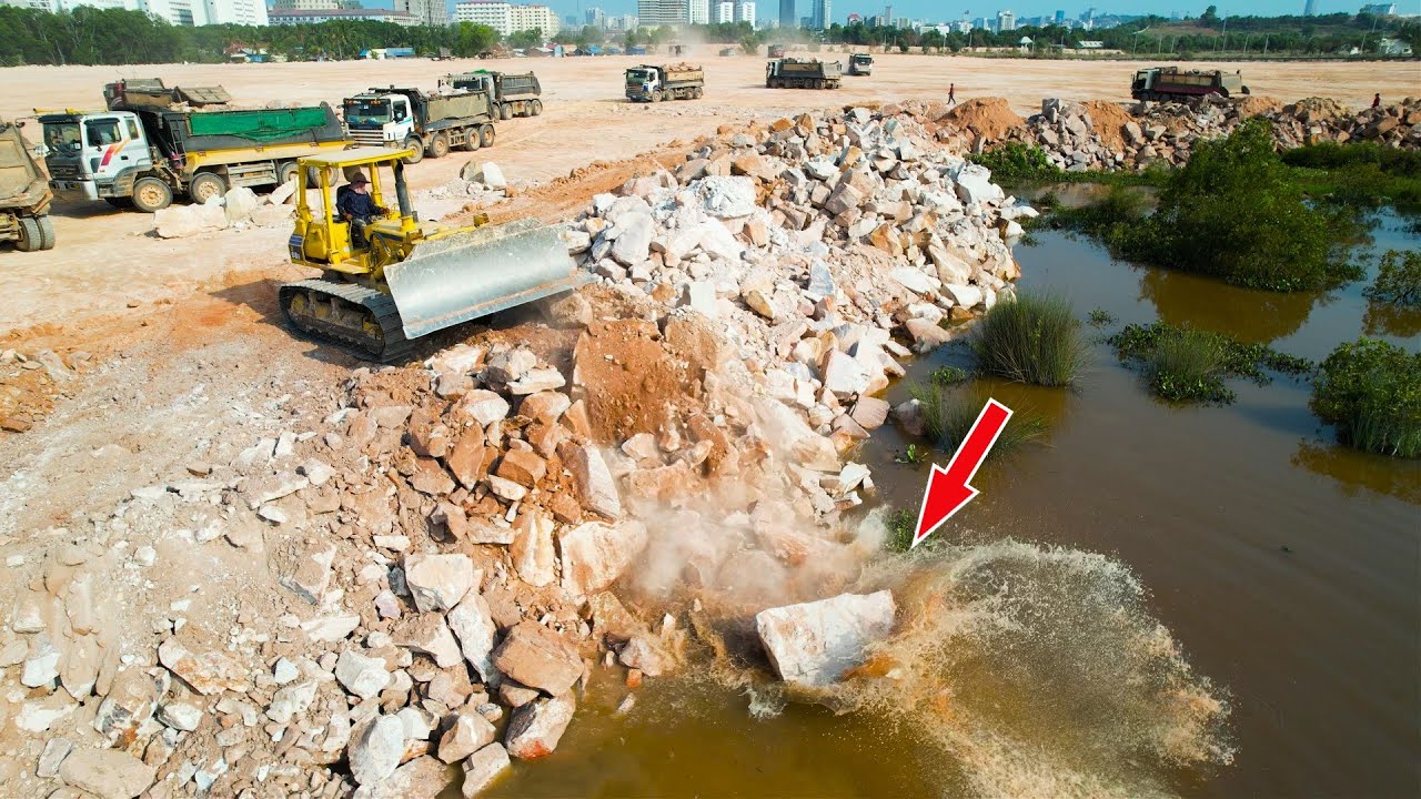 Amazing Huge Land Reclamation Process Bulldozer Moving Rock Drop To amazing-huge-land-reclamation-process-bulldozer-moving-rock-drop-to
