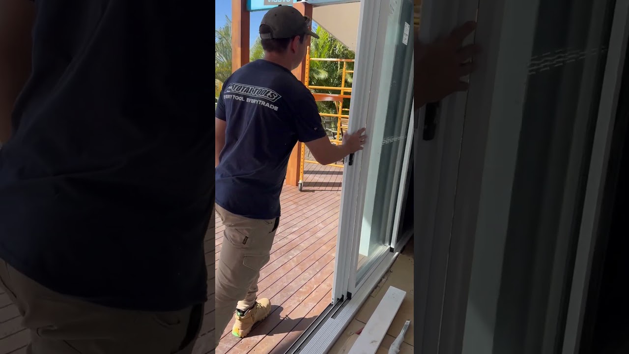 Stacking sliding door with concealed cavity panel