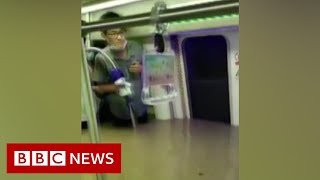 Twelve die as rain floods train tunnel in China - BBC News