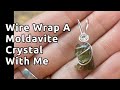 Wire wrapping a moldavite crystal