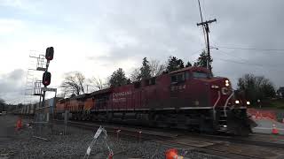 (SB) CP 8764 leads a Loaded Garbage Train / H-EVEROO through South 19TH Street Railroad Crossing.