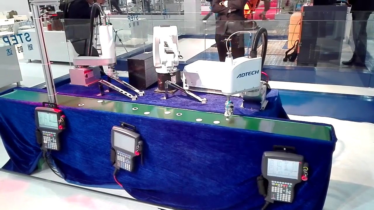 ADTECH Scara robot with vision system and 6 axis robot cooperation 2