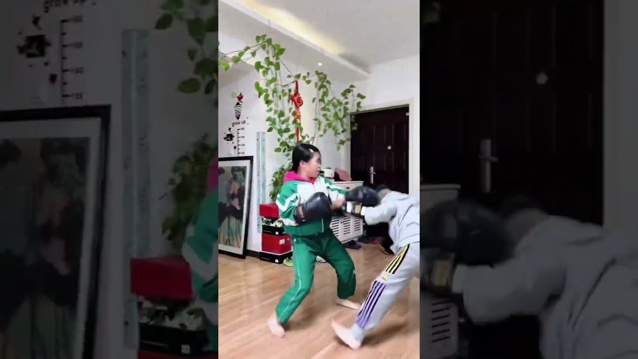 Practice sanda children sister and brother in the home               boxing  muaythai  fighter  muay