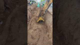 Compacting the soil in the excavation for the water channel so that it doesn't collapse #ytshorts